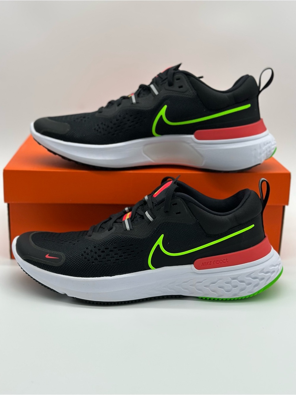 Nike Black Sneakers with Neon Green & Coral Accents